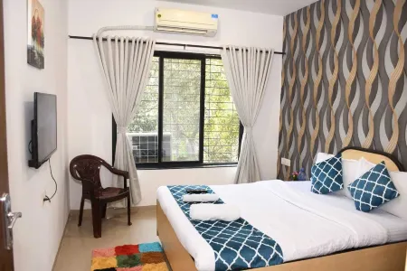 Tulsi Home Stay Отели рядом с достопримечательностью «Пляж Марве»