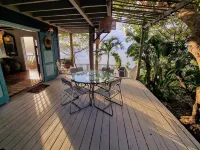 Spectacular clifftop house with hot tub next to sandy beach, stunning sea views