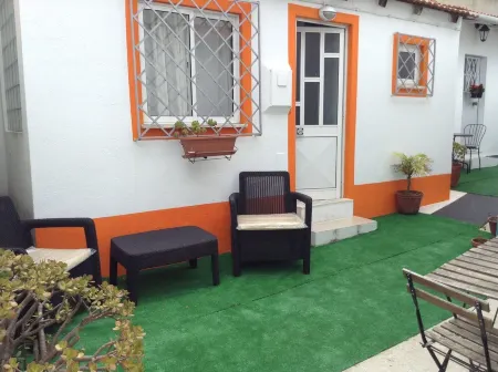 Brick wall old photographer patio house in Belem Отели рядом с достопримечательностью «Ajuda Botanical Garden»