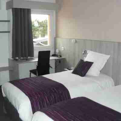 Brit Hotel Dak'Hôtel Rooms