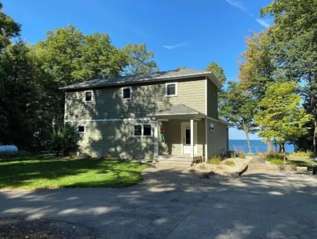 Relax on the Shores of Green Bay in Your Beautiful, Private, Two Bedroom Home