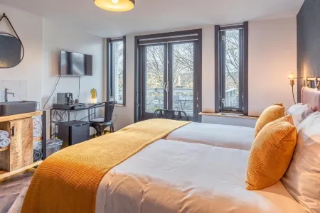 Hotel de Werf Отели в г. Huisduinen