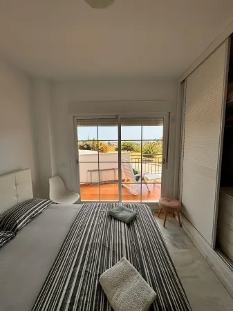 Nice and quiet one bedroom apartment with a beautiful terrace ,see view,s pool Отели рядом с достопримечательностью «Iglesia Parroquial de la Inmaculada Concepcion»