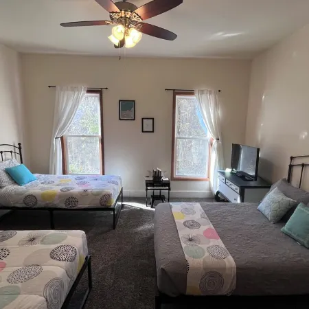 Relaxing Townhouse Downtown Dubuque with Fenced in Backyard & Pet Friendly