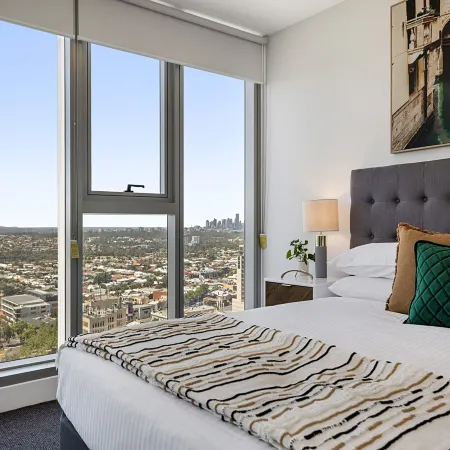 High-Rise Balcony Unit with City Views, Gym, Pool