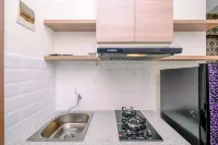 Fancy and Nice Studio Apartment at Podomoro Golf View By Travelio