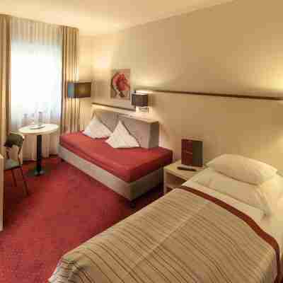 Bergers Airporthotel Memmingen Rooms