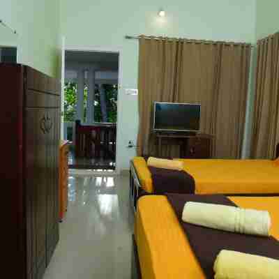 The Malabar Beach Resort Rooms