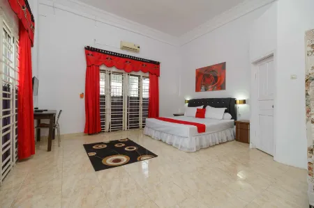 RedDoorz Syariah Near Museum Tsunami Aceh 2 Отели в г. Jaya Baru
