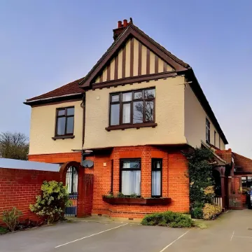 Toothbrush Rooms at Lattice Lodge - Guest Kitchen & EV Recharging