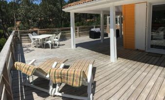 Chalet Orange Naturiste la Jenny