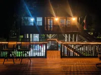 Modern Lakefront Treehouse with Pedal Boat, 2 Kayaks, Sun Deck and Arcade