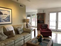 Beachfront home directly across from beach & park! Close to everything!