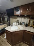 Fun Fly fisherman theme RV with AC Hotels near Marigolds Antiques & More