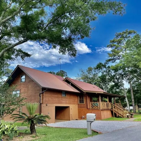 BEAUTIFUL WATERFRONT .  GNAT SCREENED BOATHOUSE AND AJOINING COVERED BOAT SLIPS