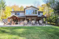 Lake Dreams, A Luxury 5-Bedroom Lakefront Home with Hot Tub