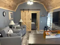 River Road Retreat.  Cabin minutes away from trails w/ hottub & seasonal pool! Hotels in Pike County