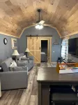 River Road Retreat.  Cabin minutes away from trails w/ hottub & seasonal pool!
