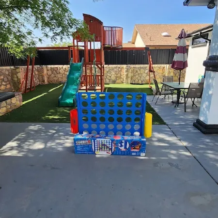 Stylish 5 bed 2.5 bath, with loft, pool table, amazing outdoor bar, kid playset.