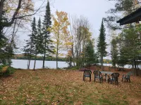 Cabin with private peninsula on Presque Isle Chain of Lakes!