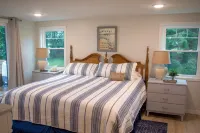 Ultimate Family Lake Retreat w/ Swim Slide, Sandy Bottom, and Bar/TV Lounge