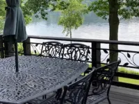 Waterfront Chalet with expansive views of lake & mountains.