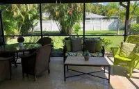 Charming 2 bed, 2 bath house, with den.  Screened lanai, 1.5 miles to the beach
