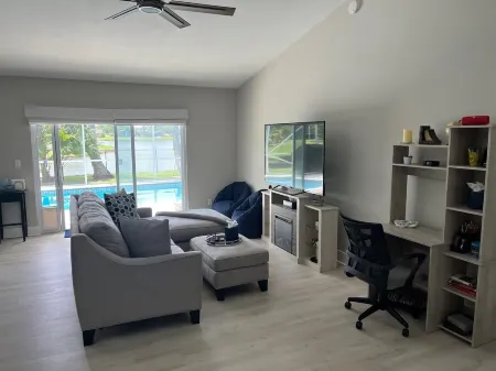 Charming 3-bedroom pool home on the lake with spectacular sunsets & close to all