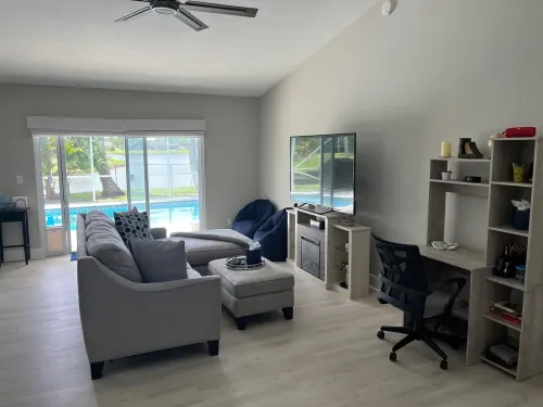 Charming 3-bedroom pool home on the lake with spectacular sunsets & close to all