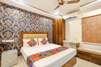FabHotel the Sunrise Inn - Nr Gayatri Vidya Parishad College of Engineering Hotels near Vaikuntham Temple, Hare Krishna Movement Gambhiram