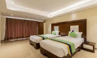 Treebo Suvarna Comforts - balcony
