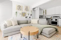 Two Balconies and Seasonal Community Pool - Bright and Airy Retreat