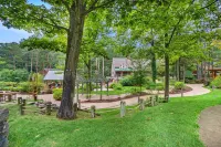 Stylish retreat with a wood fireplace, full kitchen, sunroom, & W/D access