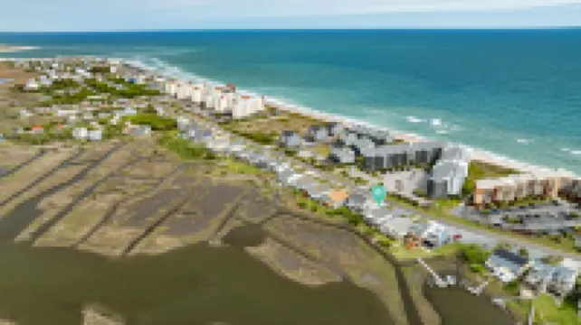 Tranquil Sound Access and Expansive Deck - Charming Coastal Retreat