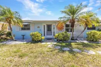 Waterfront House with Heated Pool and Fishing Dock Hotels near Publix Super Market at Quesada Commons