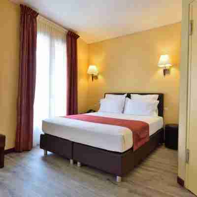 Hôtel CAPITOLE Rooms