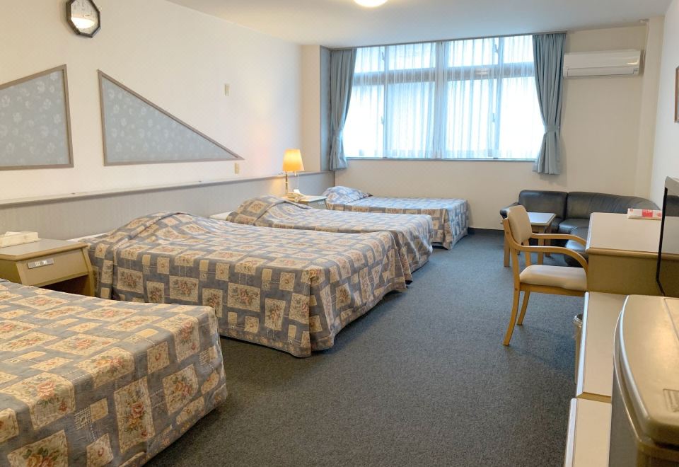 데이고 호텔의 깔끔한 객실 이미지