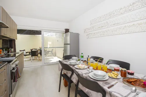 Summer Breeze Maisonette with Terrace by Getaways Malta - parking