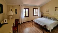 Is Benas Country Lodge Hôtels à : Putzu Idu