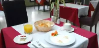 瑪格諾套房飯店 - 早餐