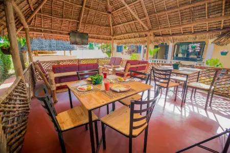 The Better Inn Отели в г. Моши