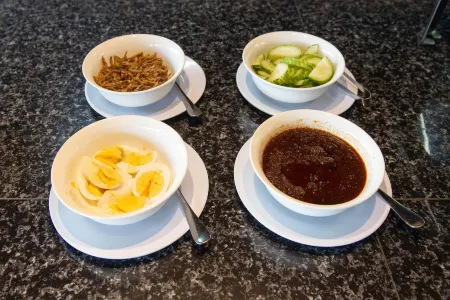 Riverra Inn Langkawi Отели рядом с достопримечательностью «Wat Koh Wanararm Langkawi»