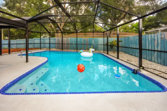 Heated Pool, Game Room and Tennis Access - Stunning Tropical Retreat