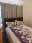 A single room is available in a spacious, well-furnished house.