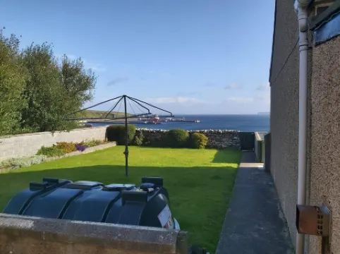 Bungalow with sea-view, near small town of Thurso.