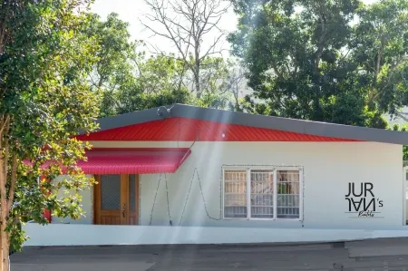 Cozy Trini Apartment,  with outdoor patio Отели в г. Сан-Хуан