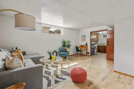 Vibrant basement suite, blending style and comfort for a delightful stay.