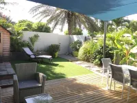 Charming outbuilding with large shaded terrace in private garden
