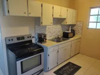 Charming family friendly home,furnished with parking facilities,near malls/beach