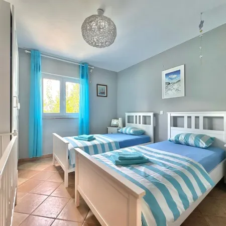 Apartment Didi with private garden, close to the center, family-friendly